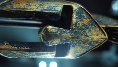 A-vertical-close-up-macro-cinematic-shot-of-a-spartan-face-design,-warrior-metal-bronze-helmet,-on-a-rotating-stand,-studio-lighting,-4K-smooth-movement