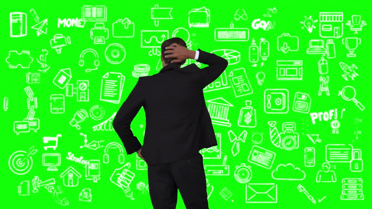 Businessman looking at green interface