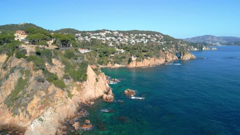 blanes turquoise waters gently caress the rocky coastline of blanes, spain, a stunning vista on the costa brava