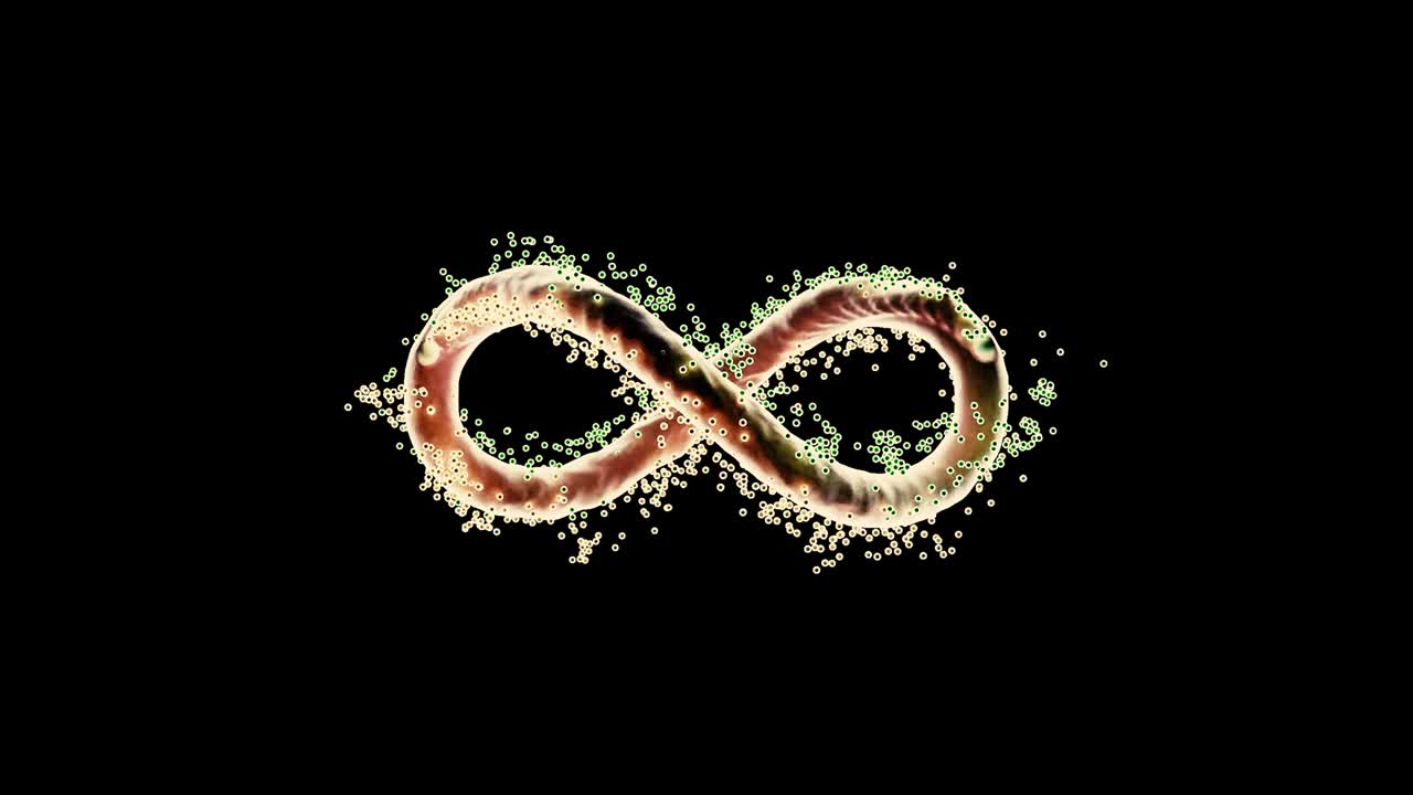 signo infinito con la energía interminable que fluye aislada en un fondo negro, bucle sin costuras. diseño. símbolo abstracto de infinito brillante con una nube de partículas, concepto de destino.