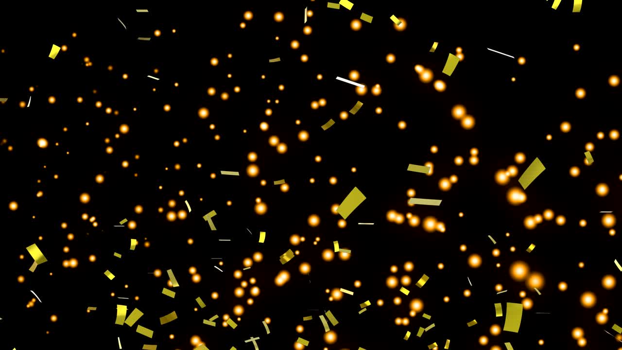 confeti dorado y manchas brillantes moviéndose contra un fondo negro