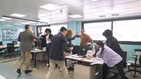 male boss throwing money to employees
