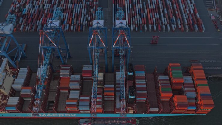 Ocean shipping hub with industrial container operations