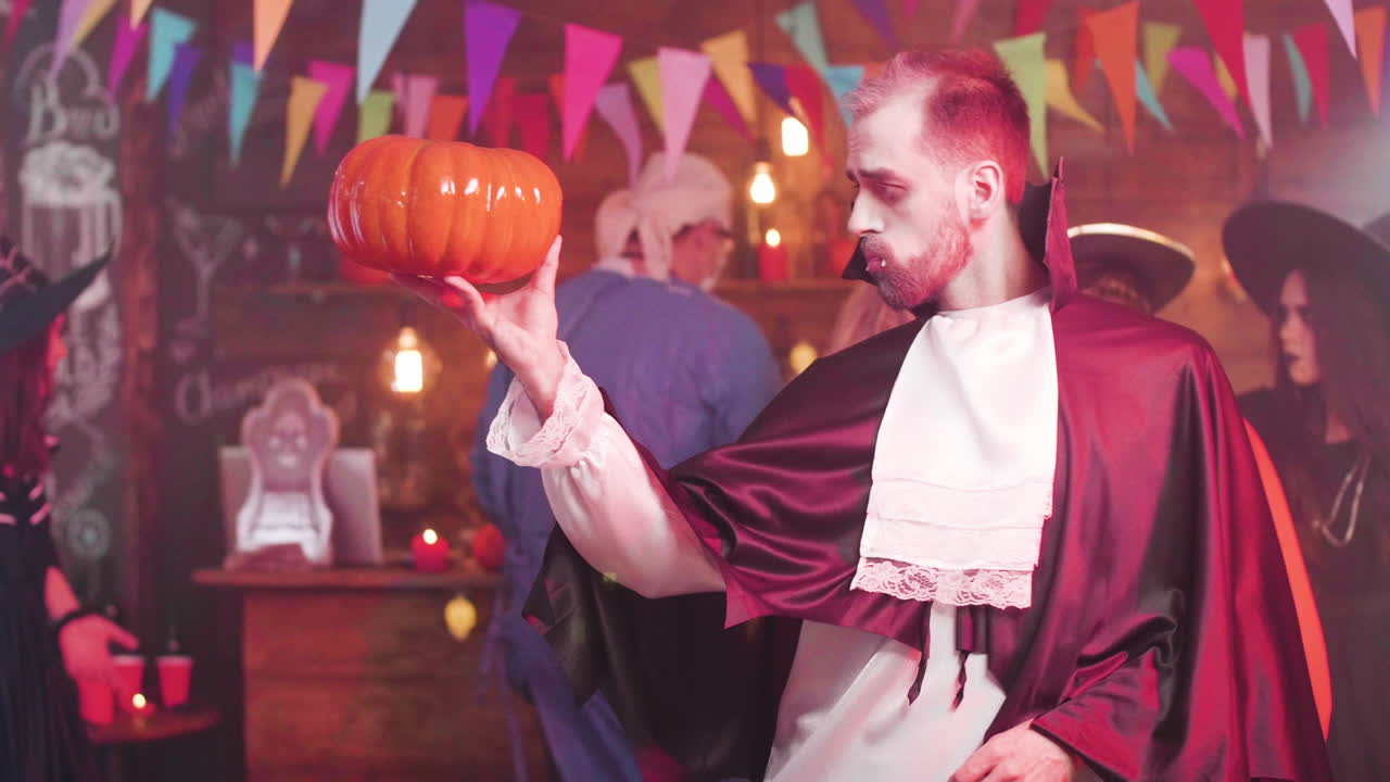 Halloween Party with People in Costumes