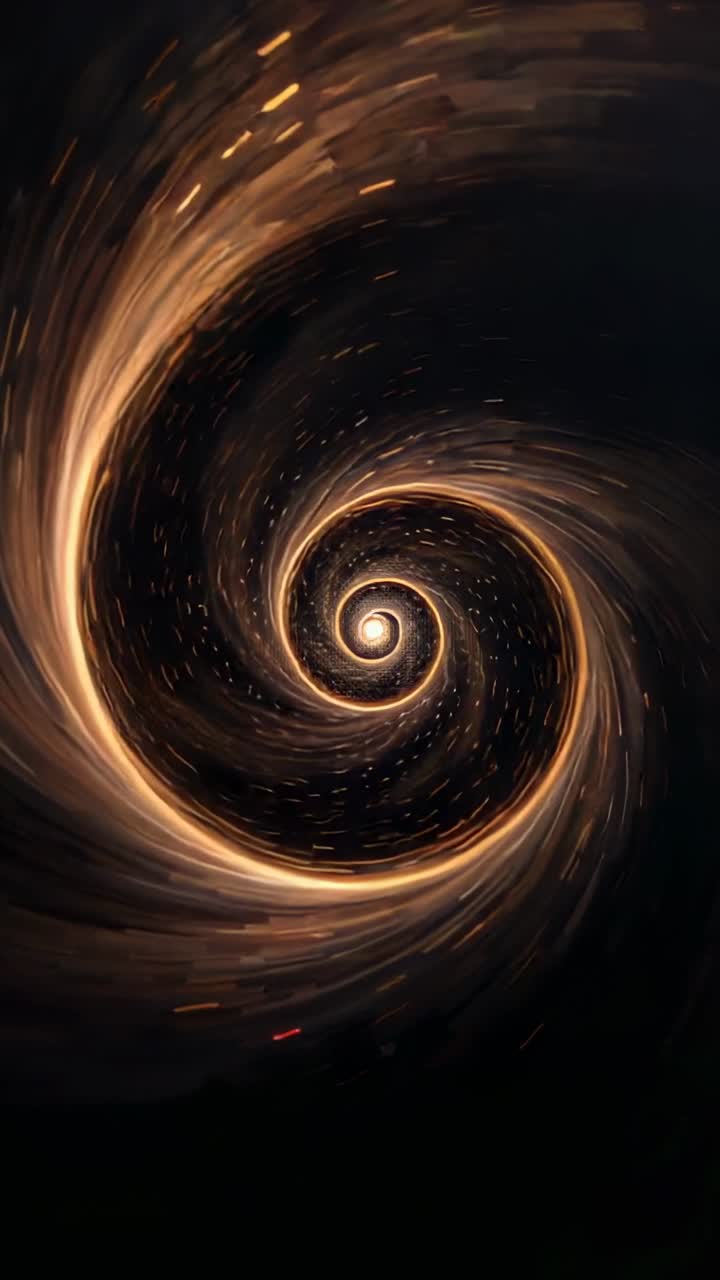 Video verticale: animazione di una spirale dorata che ruota nel vuoto, scintille che fluiscono verso l'interno per illuminare il nucleo