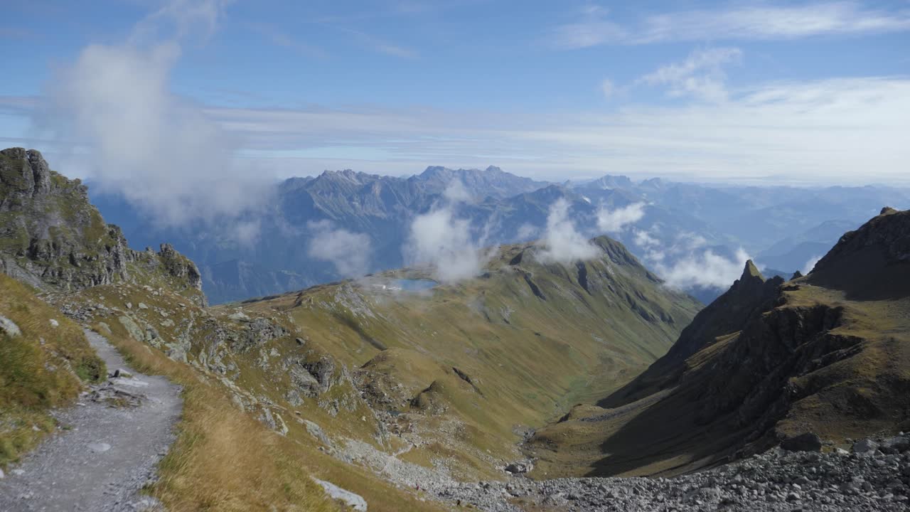 Static shot of empty Pizol mountain hike path in sunny summer
