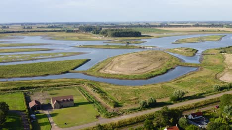 aerial high-altitude approach to the waterdunes - a nature area and recreational park in the province of zeeland, the netherlands