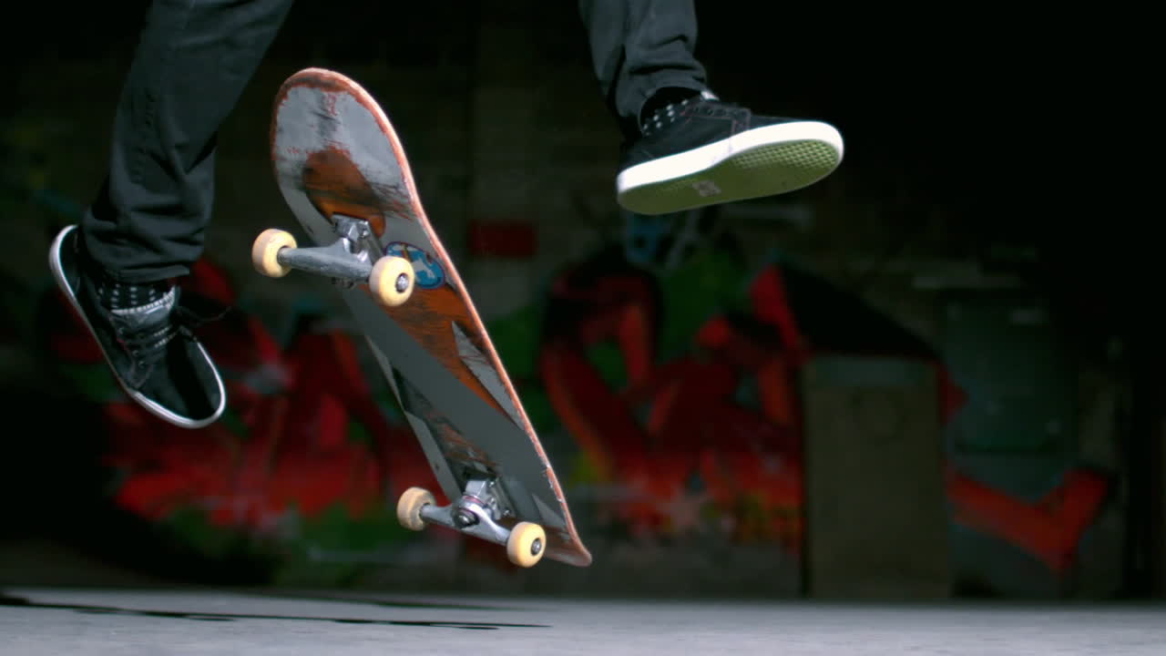 Skater performing 360 flip trick 