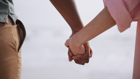 couple holding hands