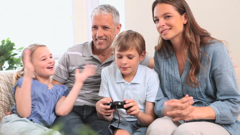 little boy playing video games