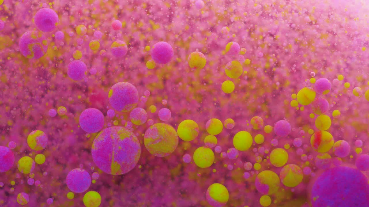 movimiento lento burbujas de color neón brillante aceite pintura fluorescente hermosa color brillante movimiento multicolor de cerca. pintura de neón acrílico. superficie fantástica. abstracto transformación de colores gravitación.