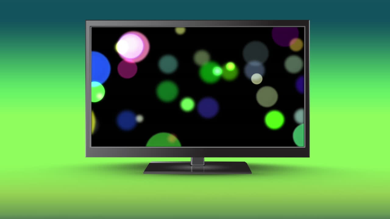 Television with bokeh lights on its screen