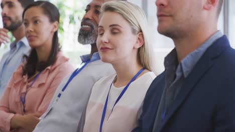 business people attending to a meeting in conference room