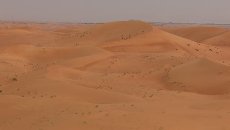 Desert-dunes-fly-over-in-daytime