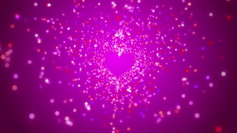 sparkling particles fly out of the love symbol heart shape. animated blurred pink background.