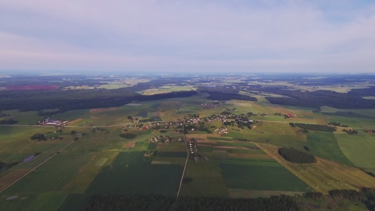 Agricultural Fields Around Settlement. 4K Aerial Shot