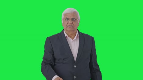 Angry-Indian-senior-manager-shouting-on-someone-Green-screen