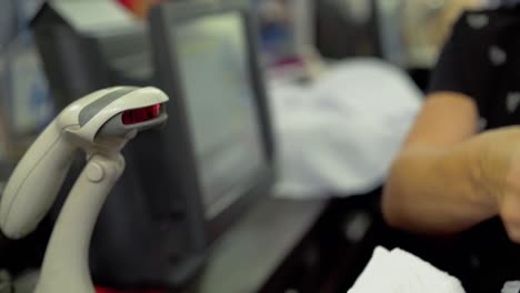 Work-of-the-cashier-in-the-supermarket-of-clothes-4