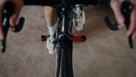 person indoor cycling workout