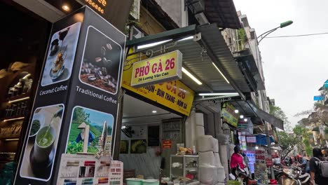 street view of a busy food shop entrance