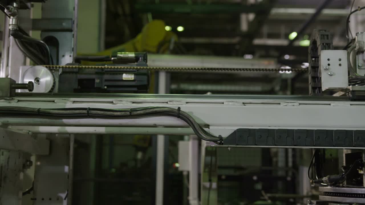 Magnetic Machine Takes and Transports Tire Rim Closeup