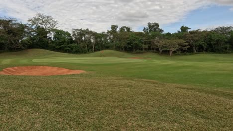 time-lapse of a golf green and surroundings.
