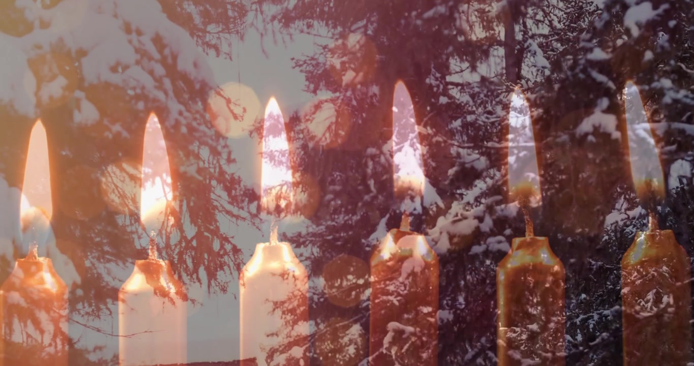 Animation af stjerneformede lyskæder og slørede juledekorationer