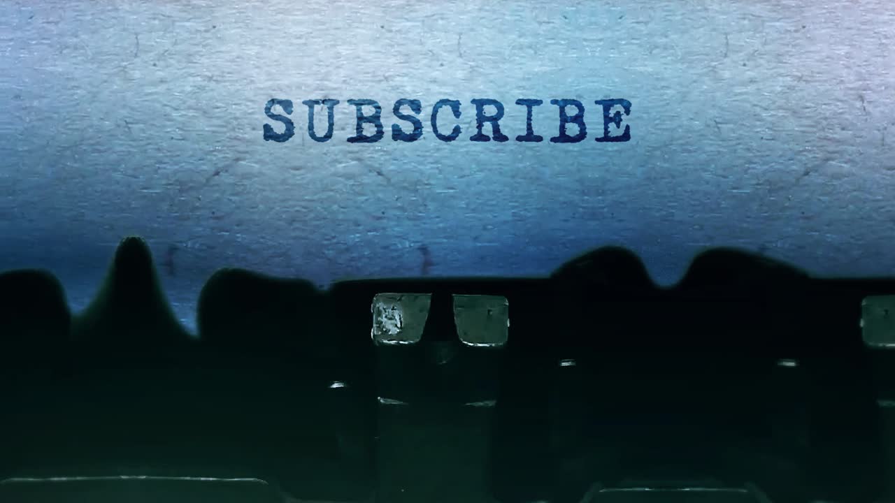 máquina de escribir antigua con suscripción impresa