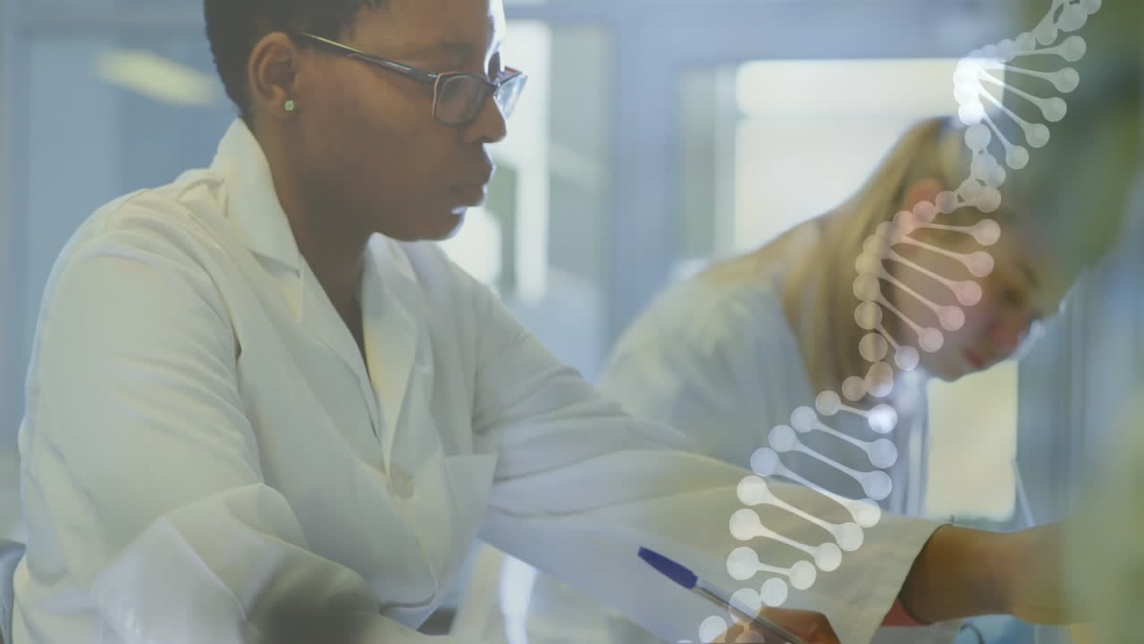 DNA strand animation over scientists working in laboratory