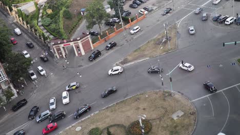 moderate traffic driving through intersection road of kyiv city