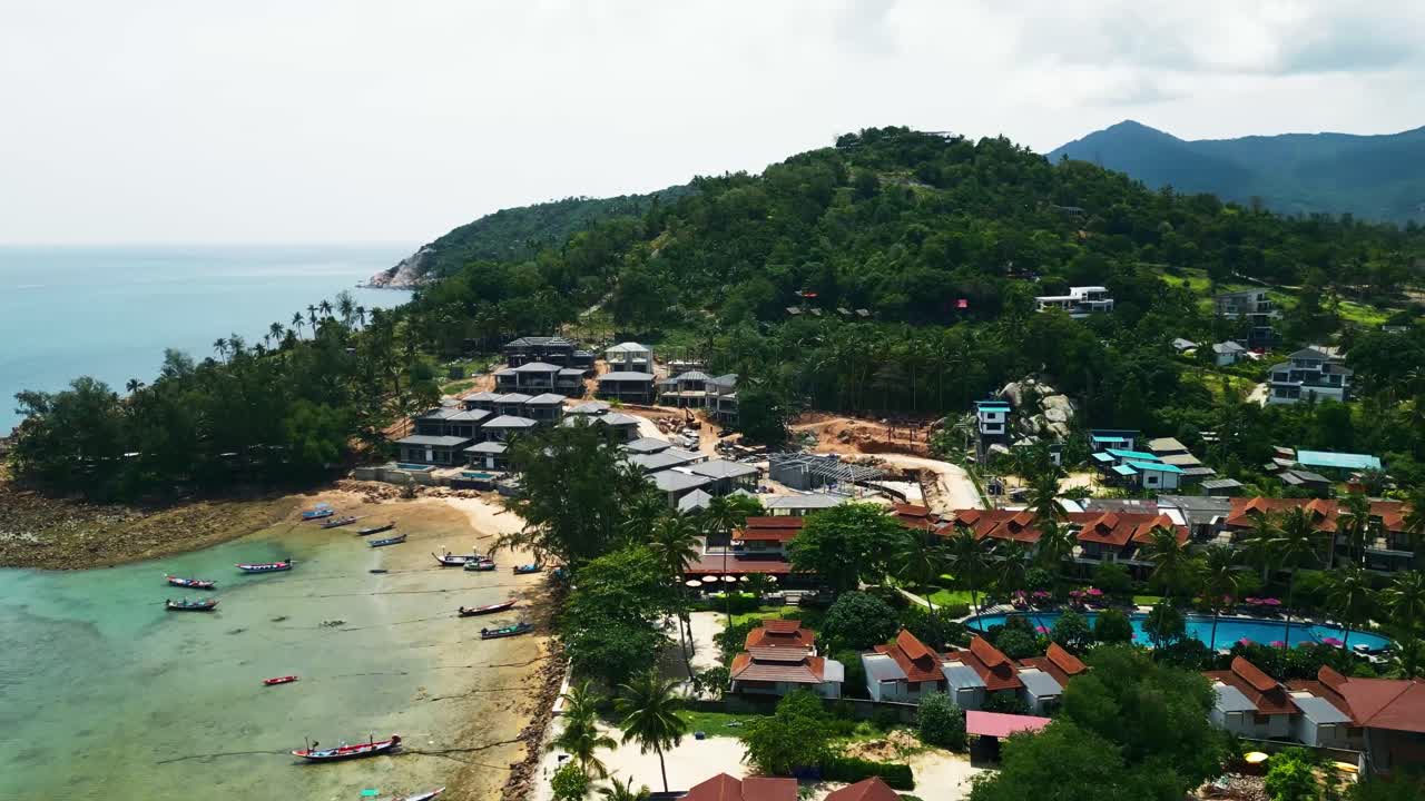 Panoramic Drone Fly Koh Pha Ngan Thailand Islet landscape beach resorts tropical trees at jungle hill, turquoise pristine water