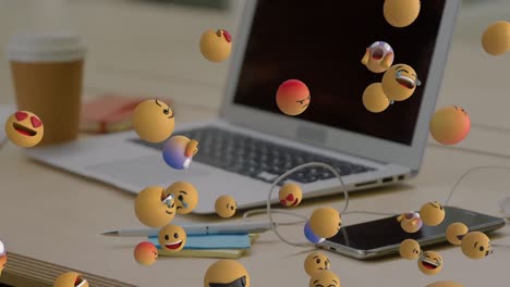 Animation-Von-Emoji-Symbolen-über-Laptop-Und-Smartphone