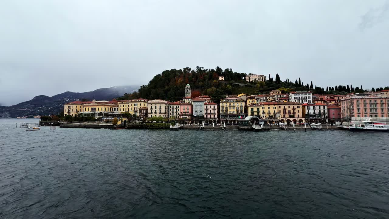 Scenic view of Bellagio's colorful lakeside buildings in Italy, tranquil ambiance