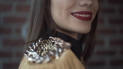 woman's shoulder tassels with chains