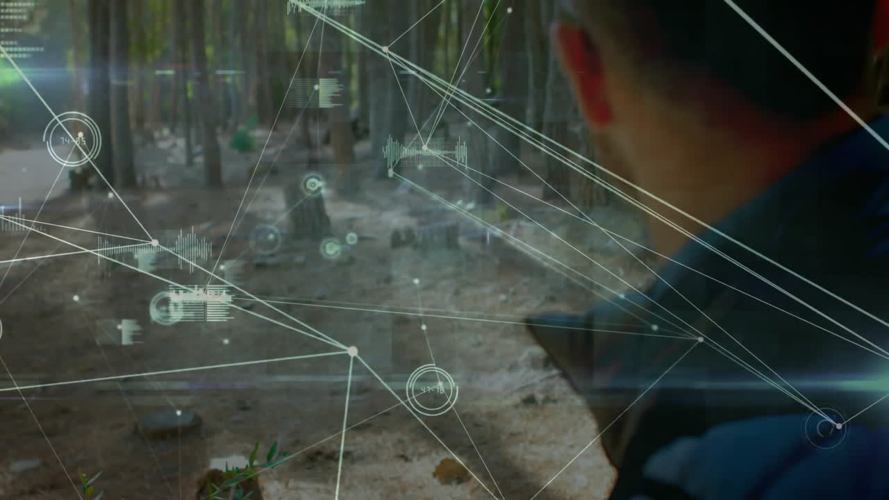 Man standing in forest clearing examining tech network overlay with glowing data nodes and charts