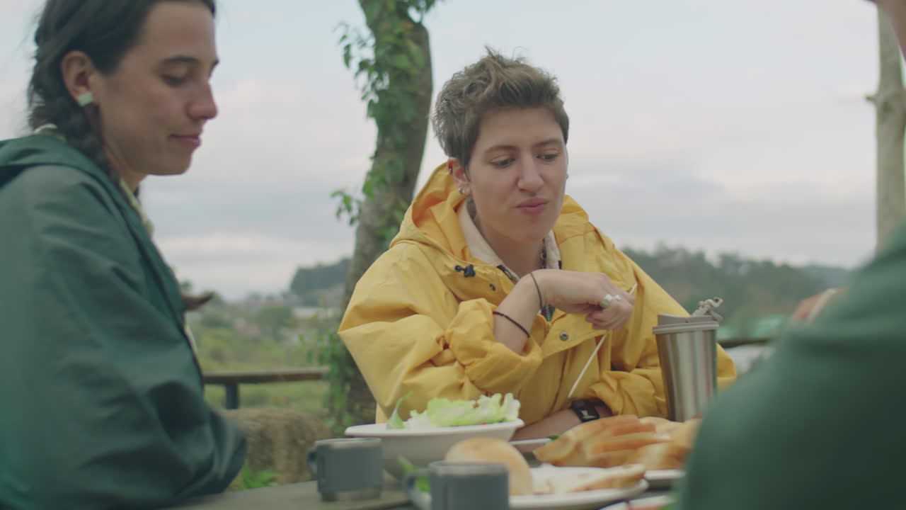 Girls Having Talk with Friend on Picnic at Campsite