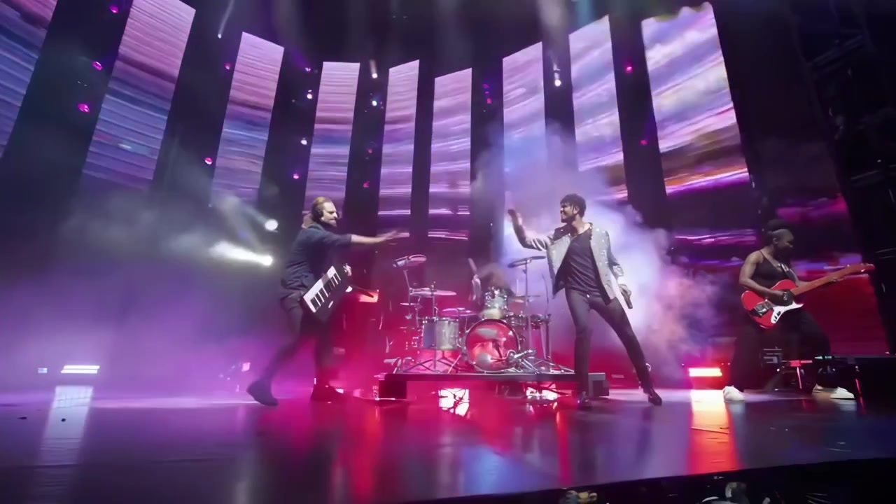 Musical Band Performing Live on Stage with Lighting Effects