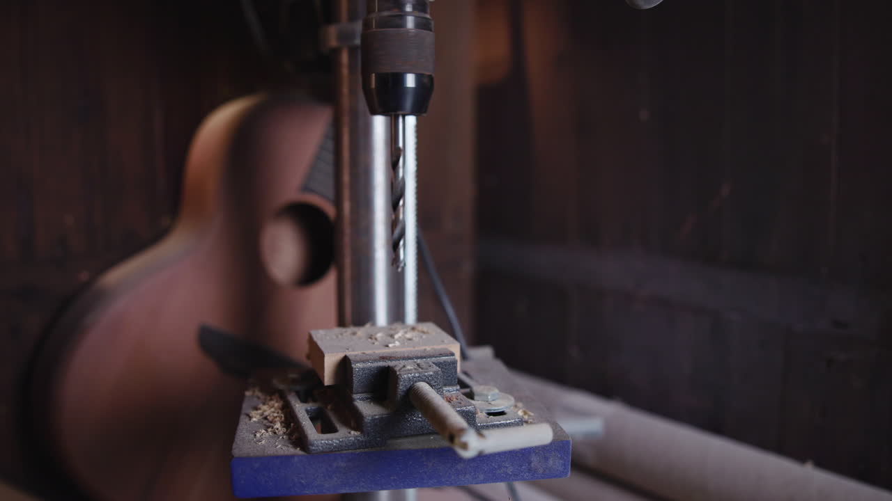 Drill Press in Workshop with Guitar