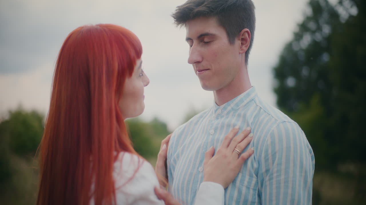 A couple in love sharing an intimate moment in nature