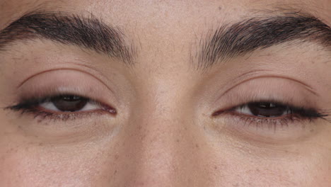 close-up-up-woman-beautiful-brown-eyes-blinking-looking-happy-at-camera-vision-eyesight