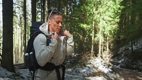 woman preparing for hiking, tatra mountains, europe - medium shot