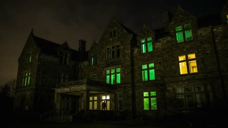 mysterious abandoned building under night sky with eerie green illuminations from windows creating an enigmatic atmosphere of intrigue and history