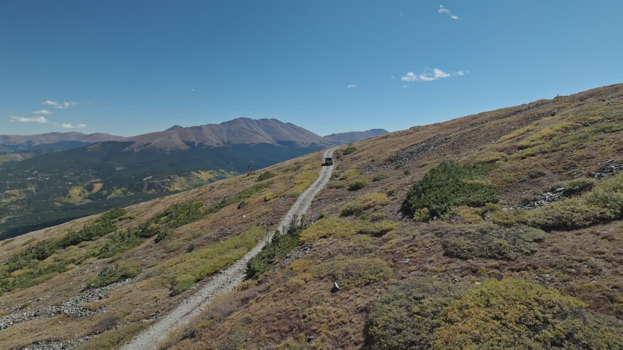 Jeep driving on a mountain trail