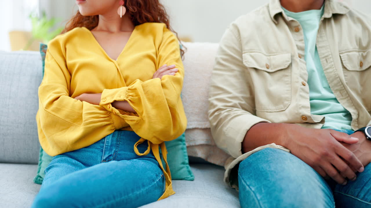 Sofa, argument and sad couple in apartment