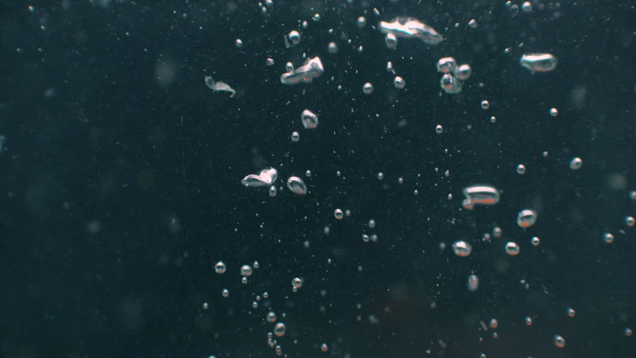 Tomato Under water with air bubbles and in slow motion. Fresh and juicy healthy vegetarian product. Salad ingredients.