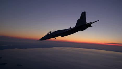 military jet in flight at sunrise/sunset