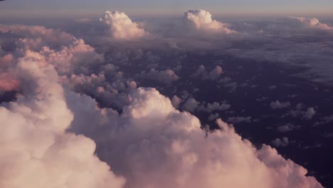 flight over the clouds filmed from a plane flying towards the asian city baku in azerbaijan