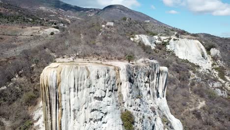 petrified waterfall in the mountains of oaxaca known as hierve el agua drone view