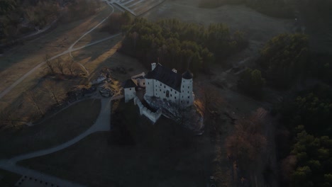 mysterious european royal castle in cold polish wilderness