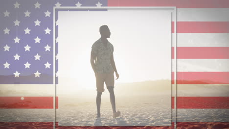 bandera estadounidense con efecto de falla contra hombre afroamericano caminando por la playa